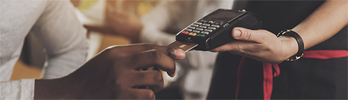 person making purchase with debit card