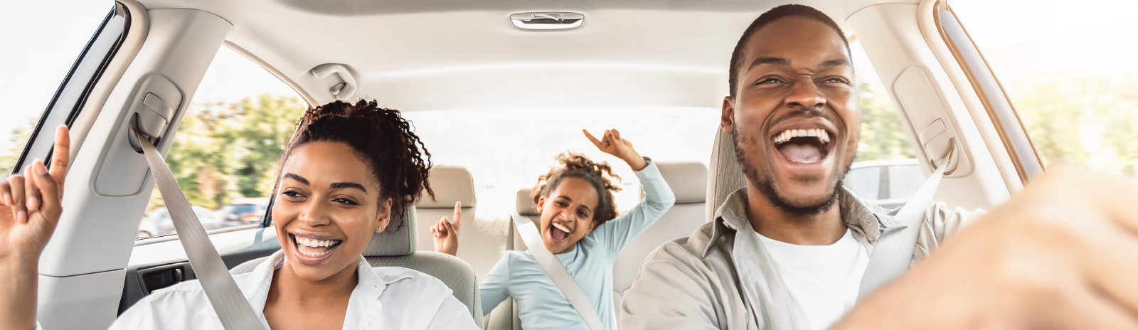 family in car