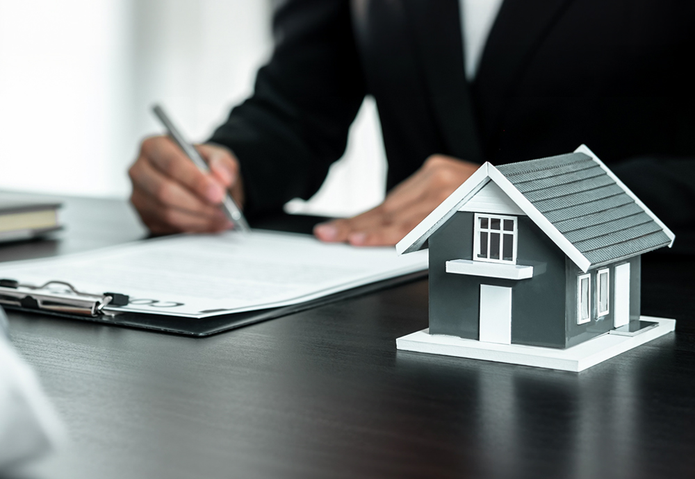 Mortgage lender with miniature house